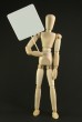 Wooden Man Holding Blank Sign Photo